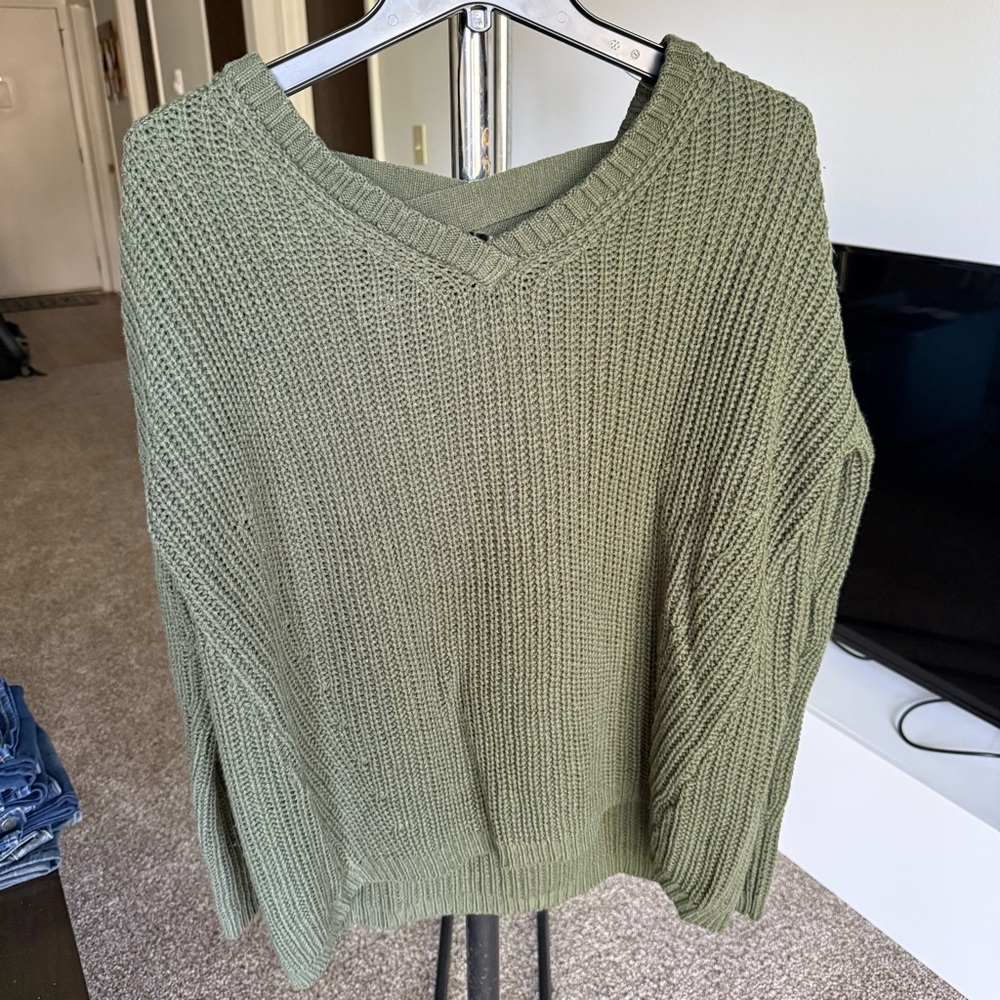 Women's V-neckline and a distinctive criss-cross strap detail on the back